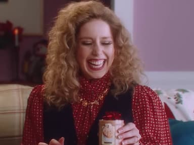 Woman giving gift to Jen